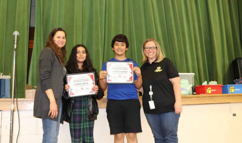 Ximena and Gabriel win the IPA student leadership award.